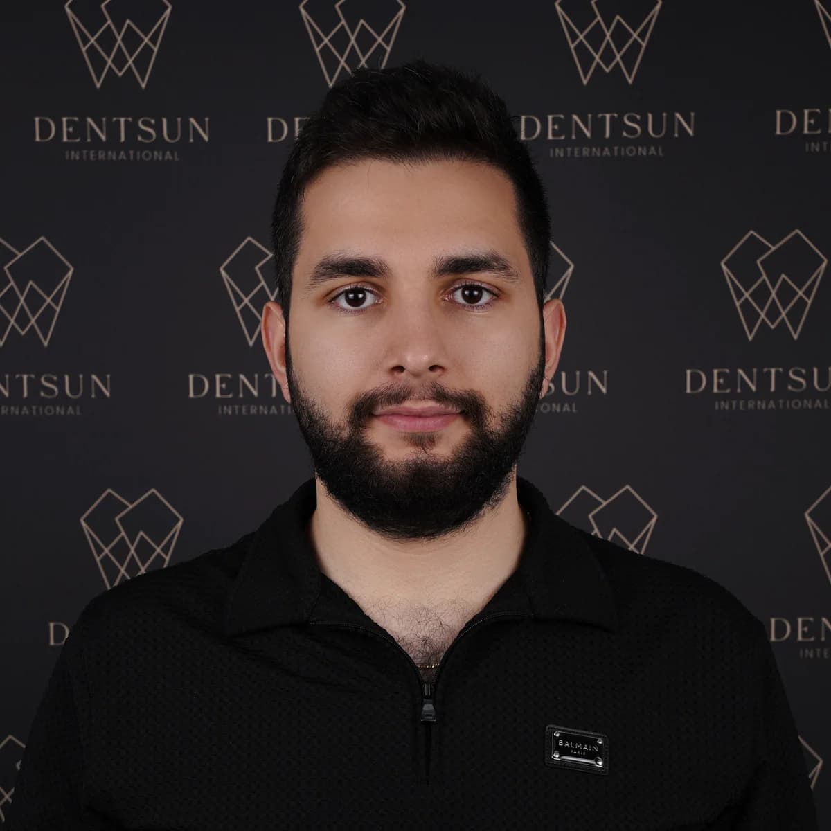 Mert Ö. — Co-Founder & Dentist